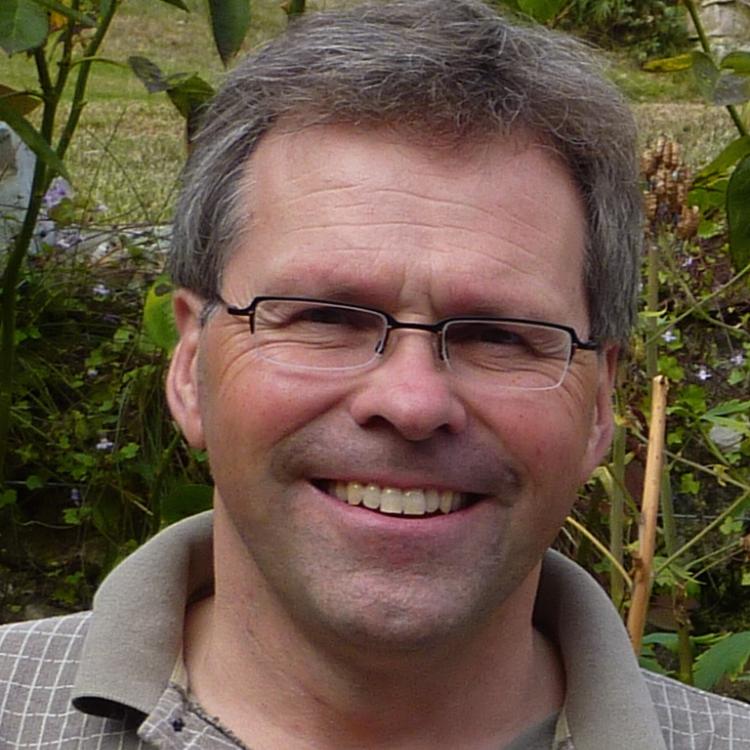 Dr.  Terence Ozolins